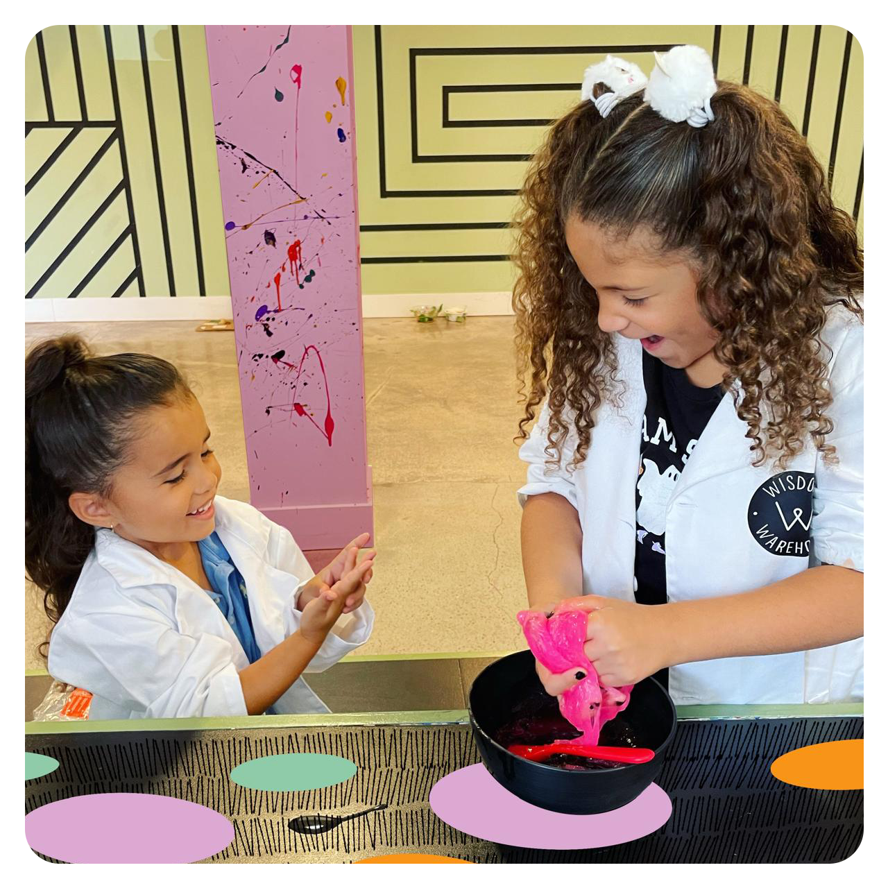 Students making slime in lab coats